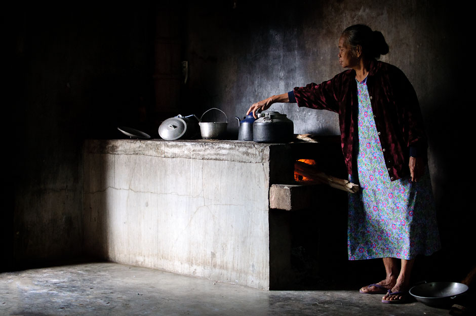 Blaan women cooking in her kitchen