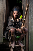 Manobo Man with Bird, Philippines.