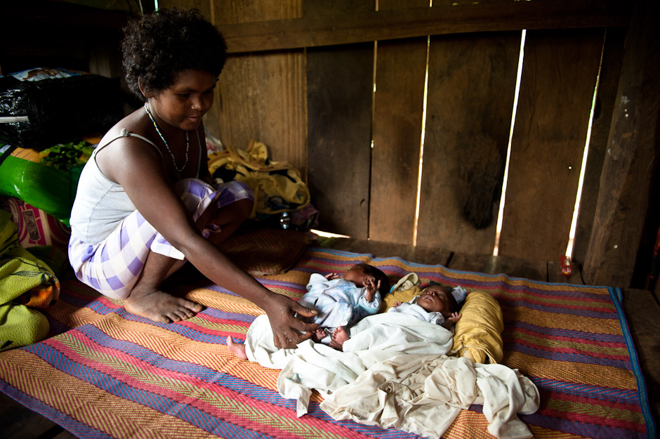 Newborn Agta babies in their home.