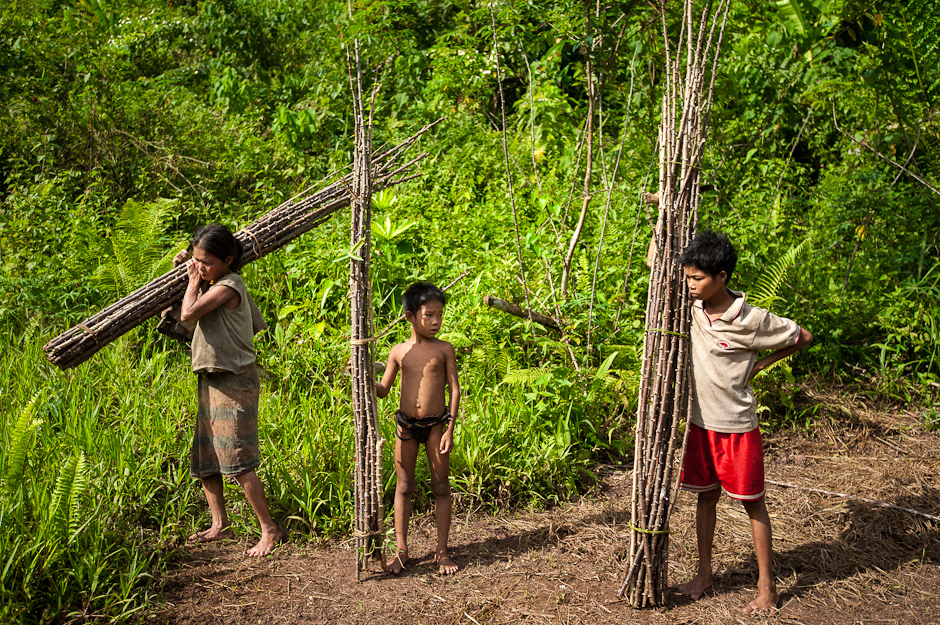 Tau't Bato family transporting rattan