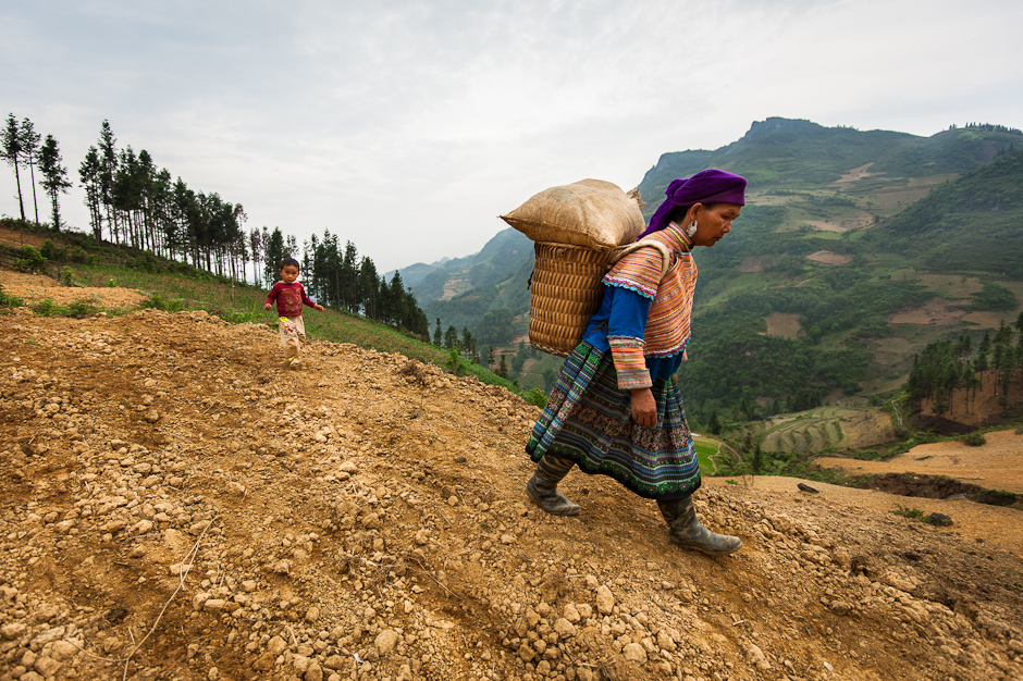 Hmong walking in mountains