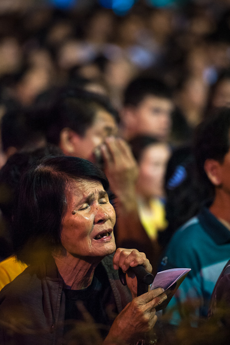 Devotee singing at mass